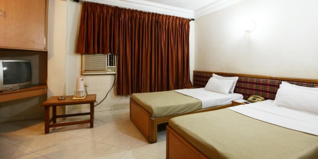 Hotel Prudent Vadodara Chambre photo